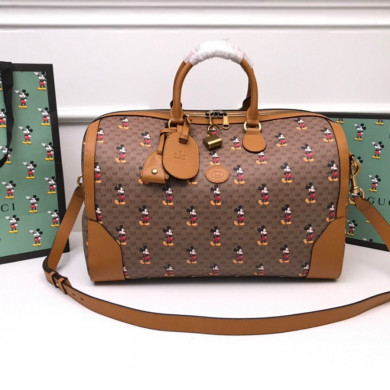 547953 Disney x Gucci medium carry-on duffle