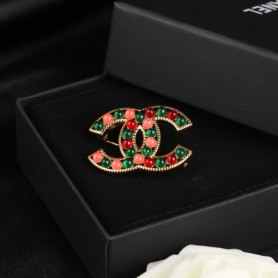 CHANEL BROOCHES