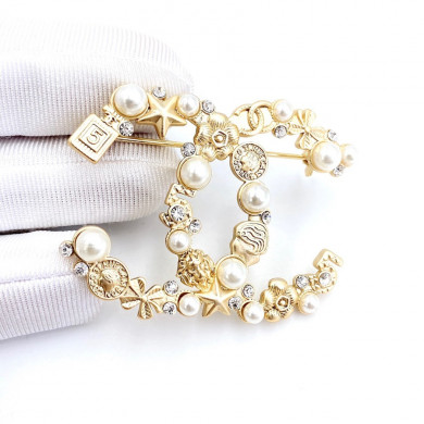 CHANEL BROOCHES