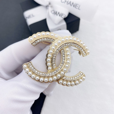 CHANEL BROOCHES