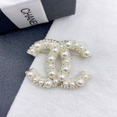 CHANEL BROOCHES