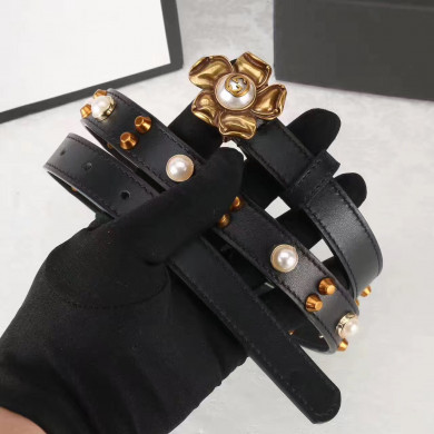Studded leather belt WITH metal flower, GUCCI Belts