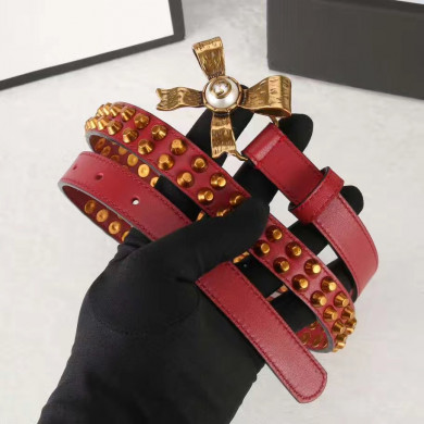Studded leather belt WITH metal bow, GUCCI Belts