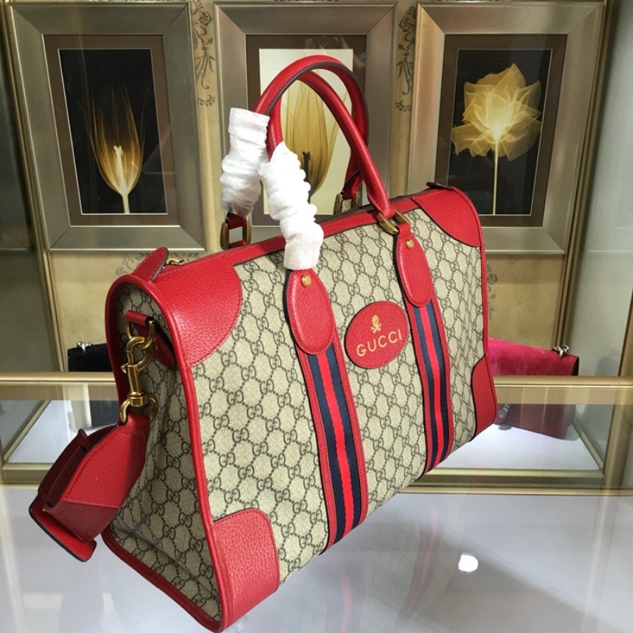 459311, Gucci Courrier soft GG Supreme duffle bag