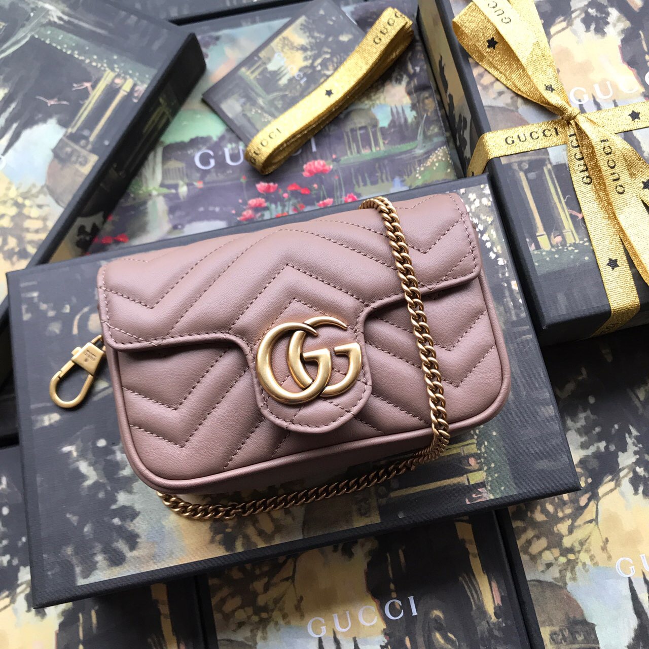 476433 GG Marmont matelassé leather super mini bag, Women's Mini Bags
