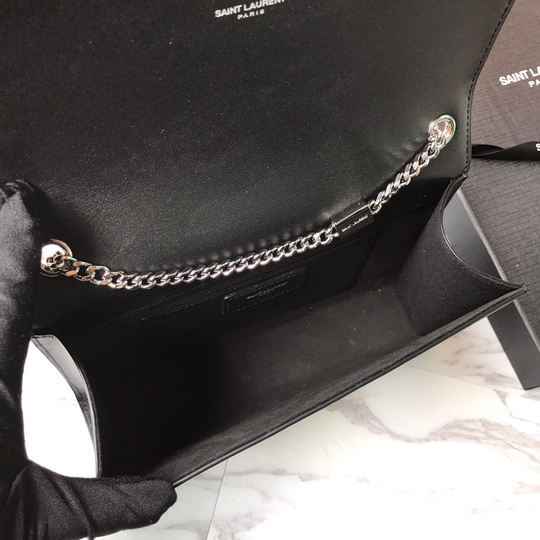 354119 KATE MEDIUM BAG WITH LEATHER TASSEL IN GRAIN DE POUDRE EMBOSSED LEATHER, Yves Saint Laurent YSL