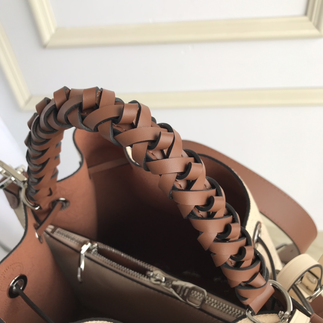 M55801 MURIA Leather Bucket Bag, Crossbody Purse | LOUIS VUITTON