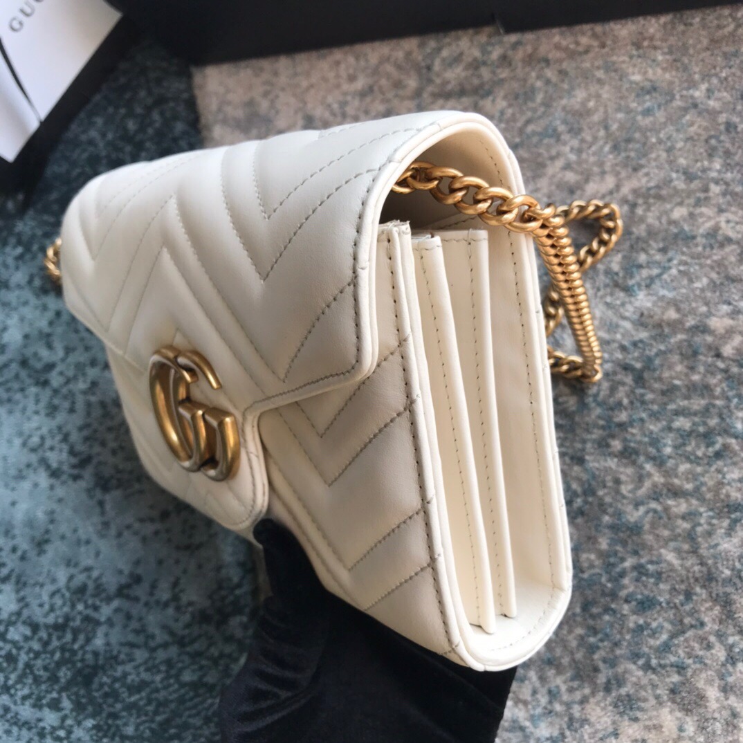 474575 Gucci GG Marmont matelassé mini bag