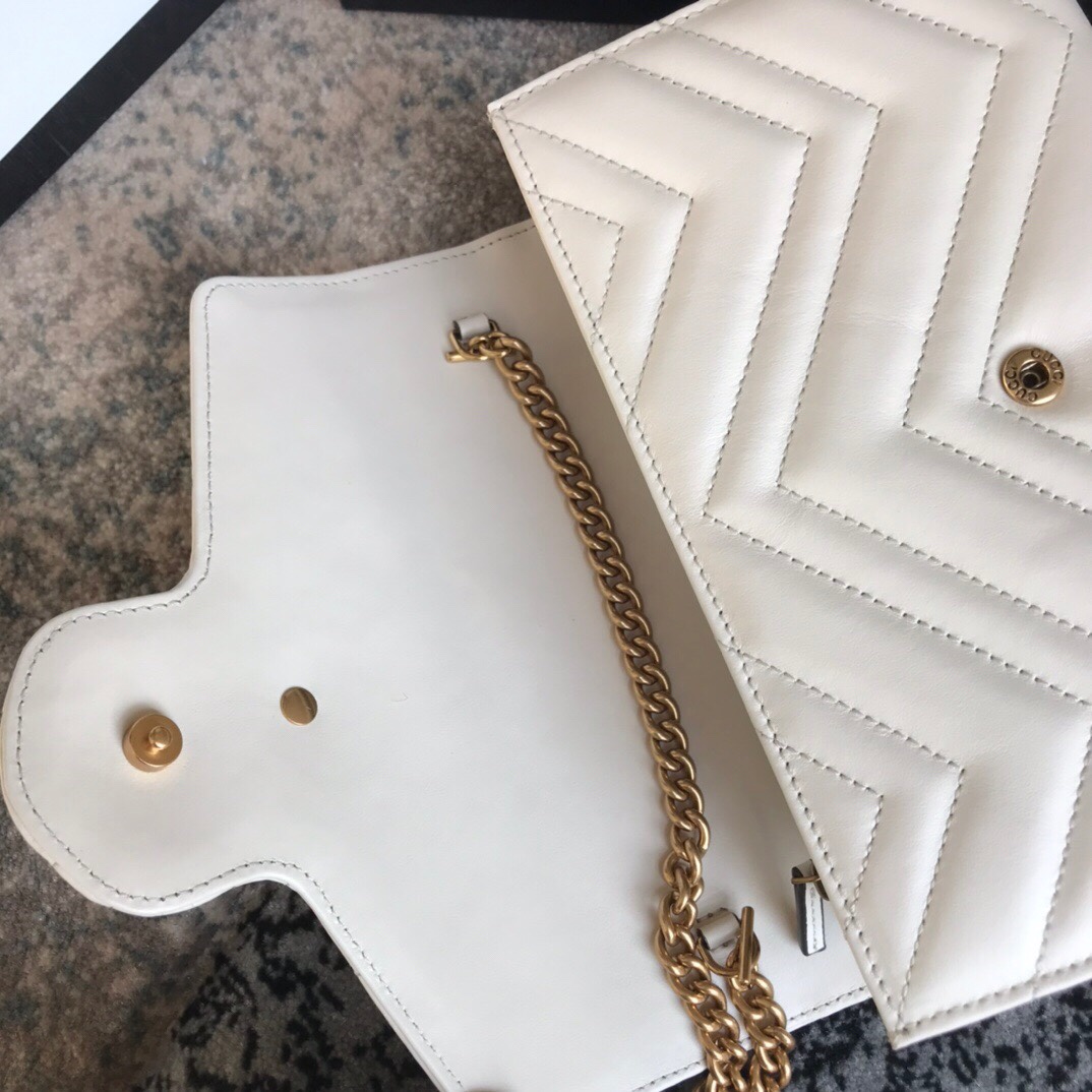 474575 Gucci GG Marmont matelassé mini bag