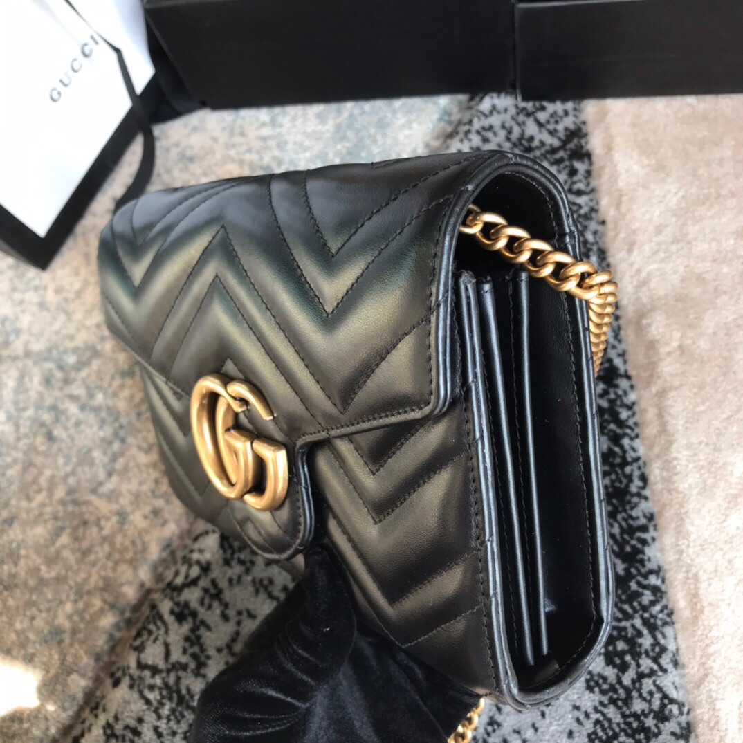 474575 Gucci GG Marmont matelassé mini bag