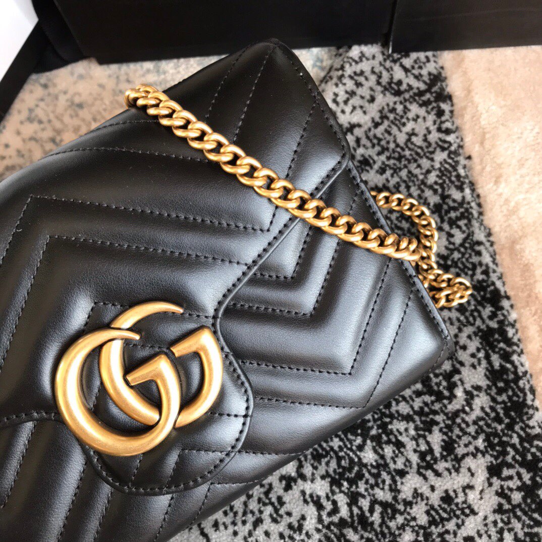 474575 Gucci GG Marmont matelassé mini bag