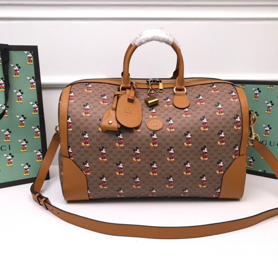 547953 Disney x Gucci medium carry-on duffle