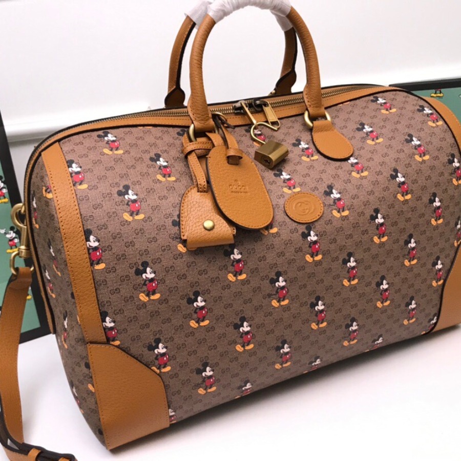 547953 Disney x Gucci medium carry-on duffle