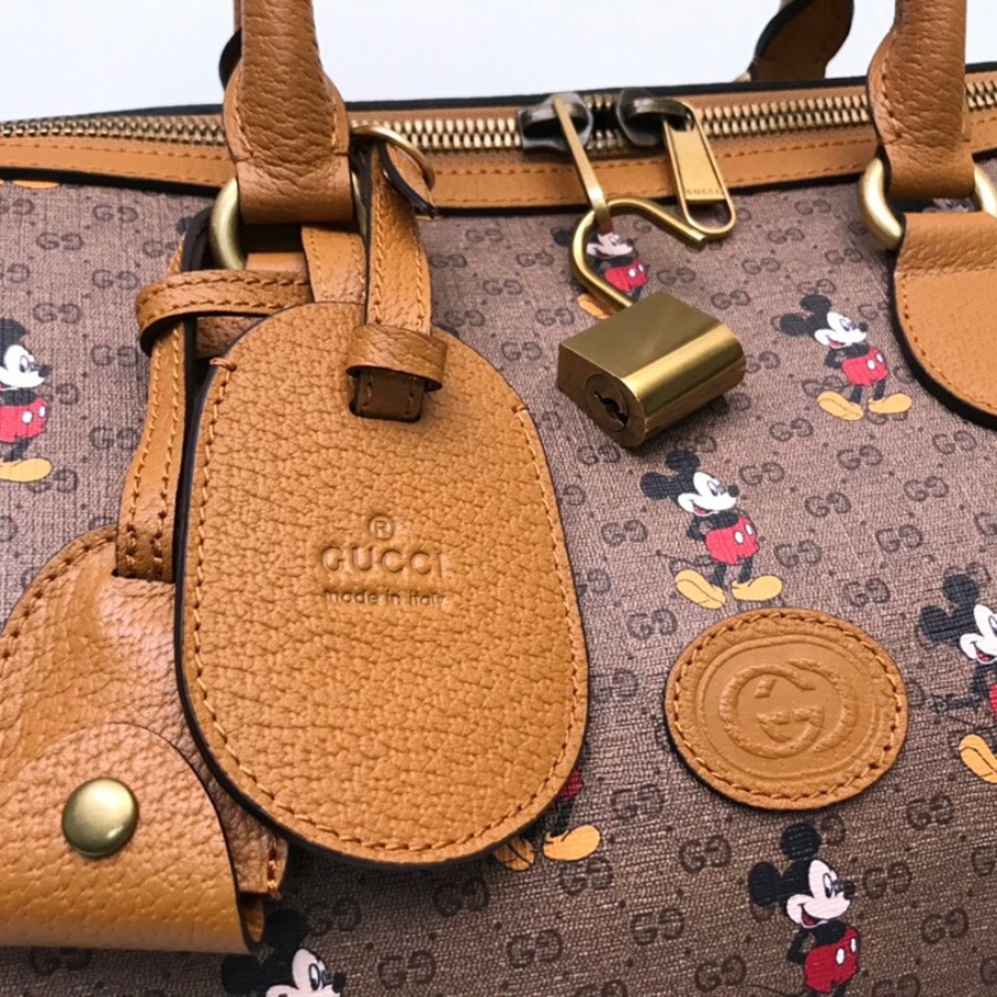 547953 Disney x Gucci medium carry-on duffle