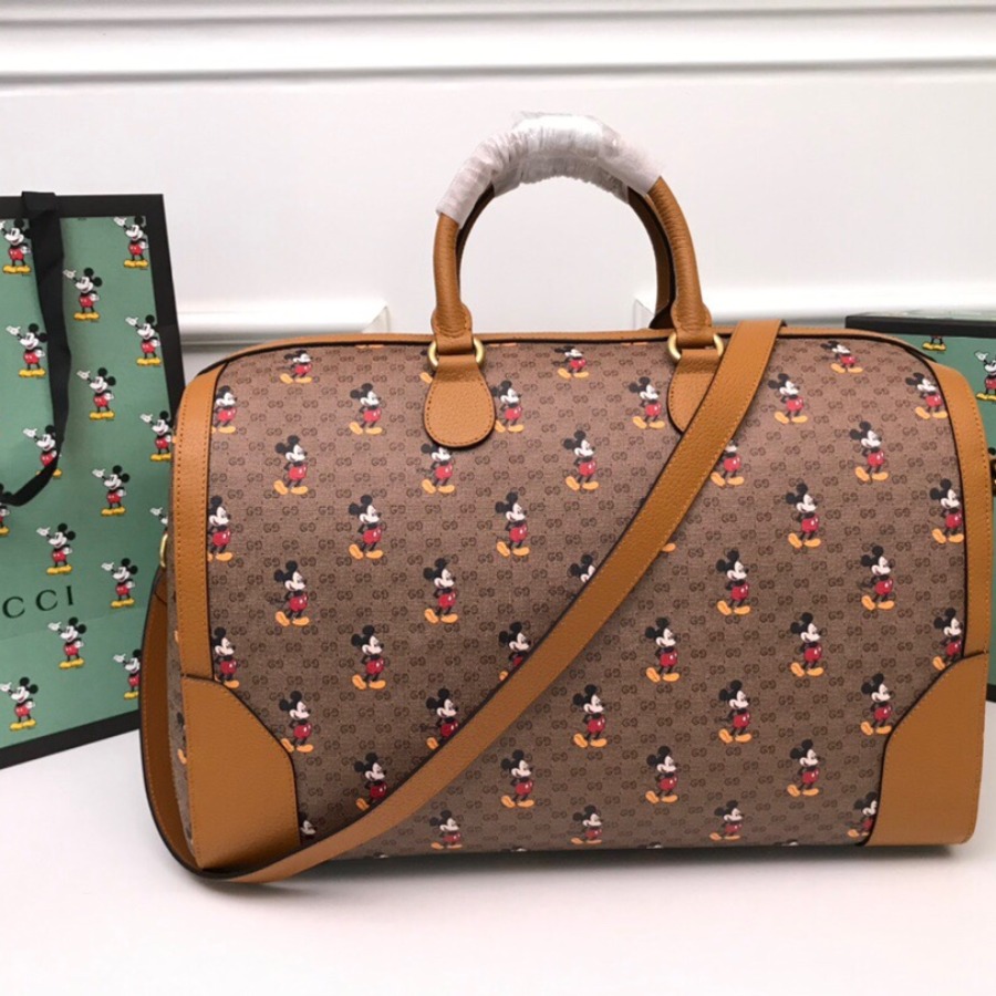 547953 Disney x Gucci medium carry-on duffle