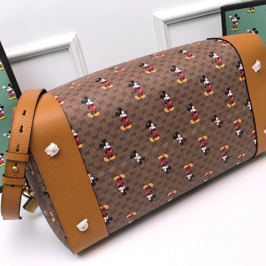 547953 Disney x Gucci medium carry-on duffle