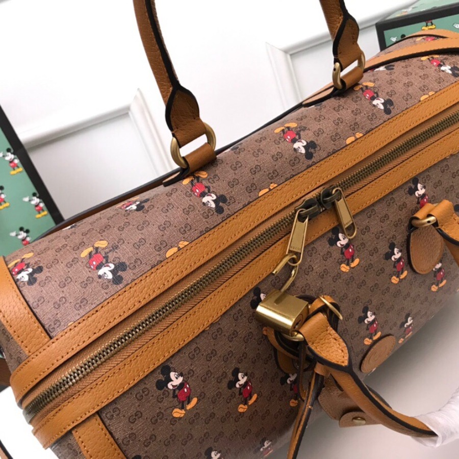 547953 Disney x Gucci medium carry-on duffle