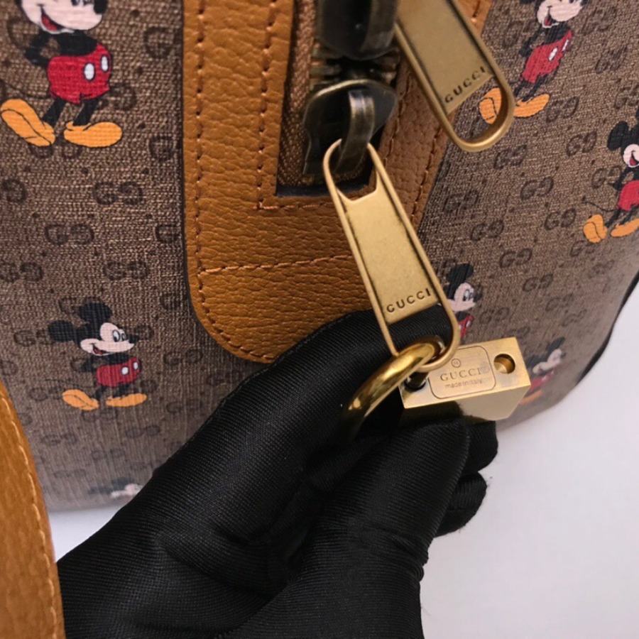 547953 Disney x Gucci medium carry-on duffle
