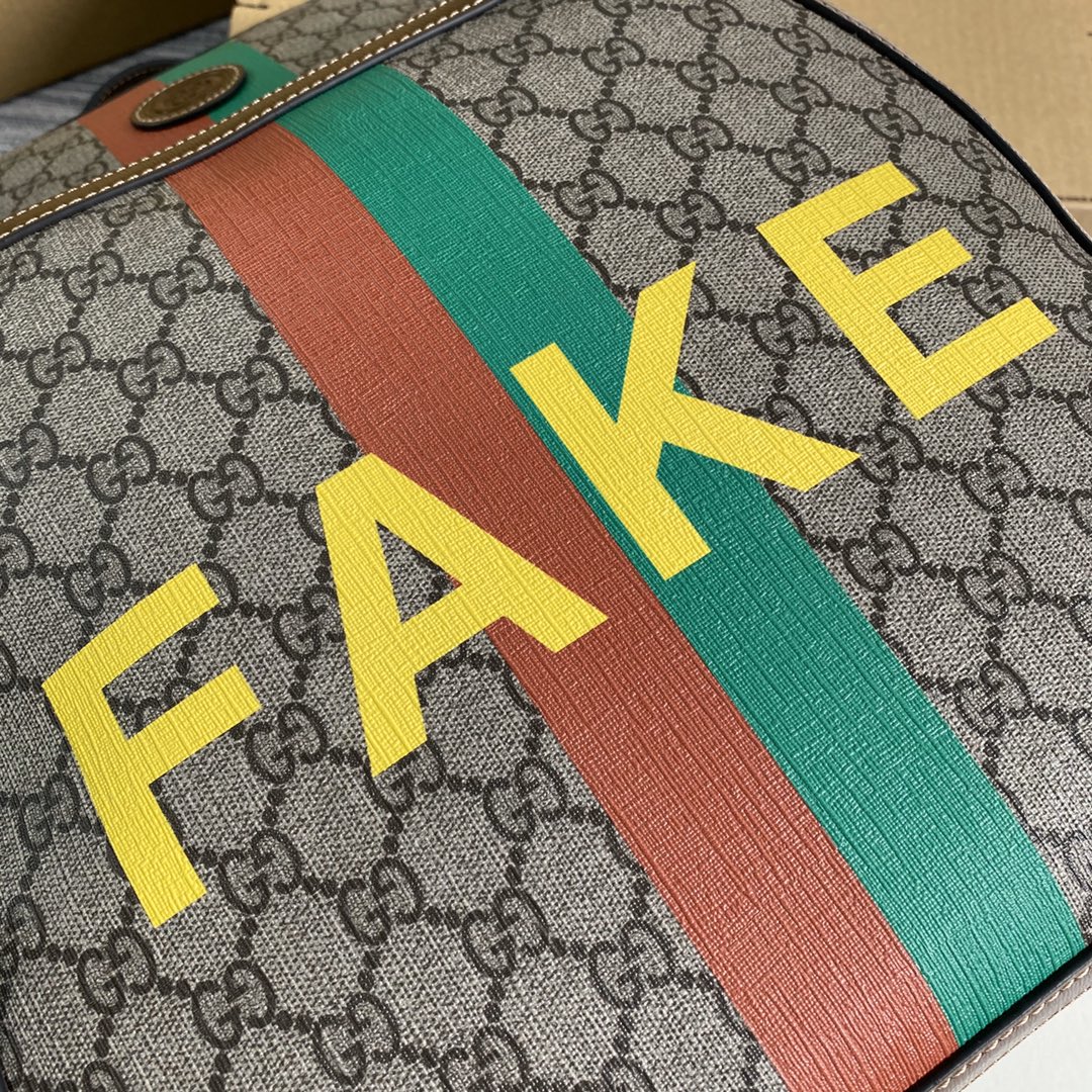 636654 'Fake/Not' print medium backpack, GUCCI Backpacks