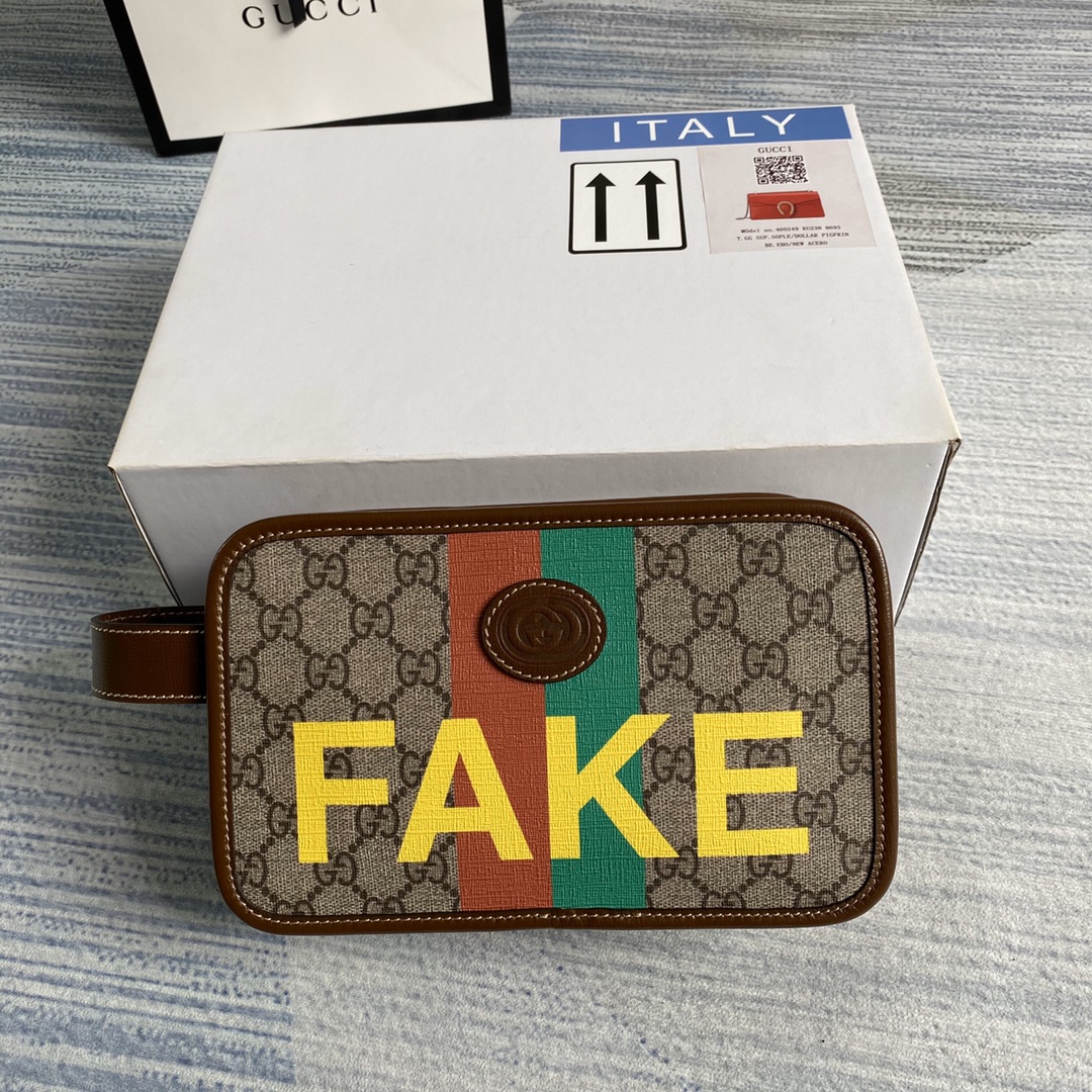 636243  'Fake/Not' print cosmetic case, GUCCI Travel Pouches