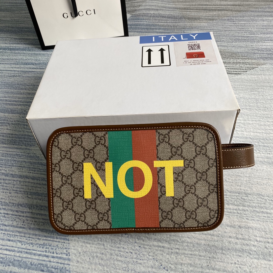 636243  'Fake/Not' print cosmetic case, GUCCI Travel Pouches
