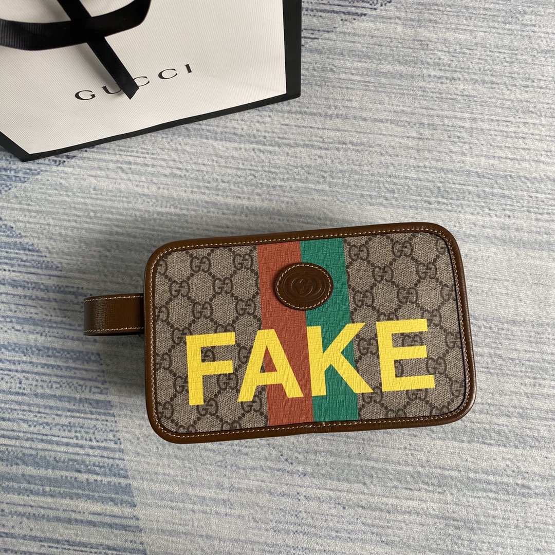 636243  'Fake/Not' print cosmetic case, GUCCI Travel Pouches