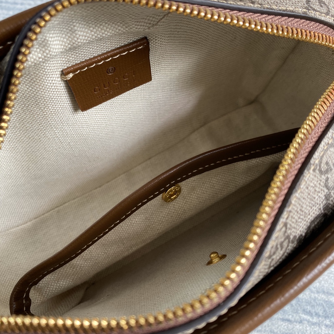 636243  'Fake/Not' print cosmetic case, GUCCI Travel Pouches