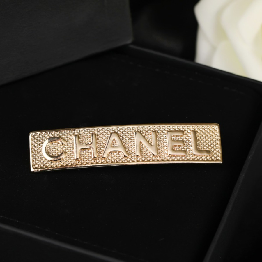 CHANEL BROOCHES