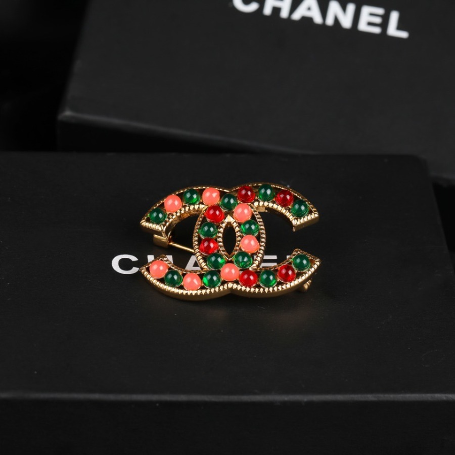 CHANEL BROOCHES