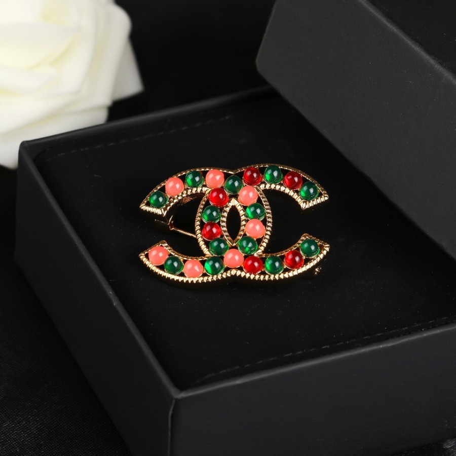CHANEL BROOCHES