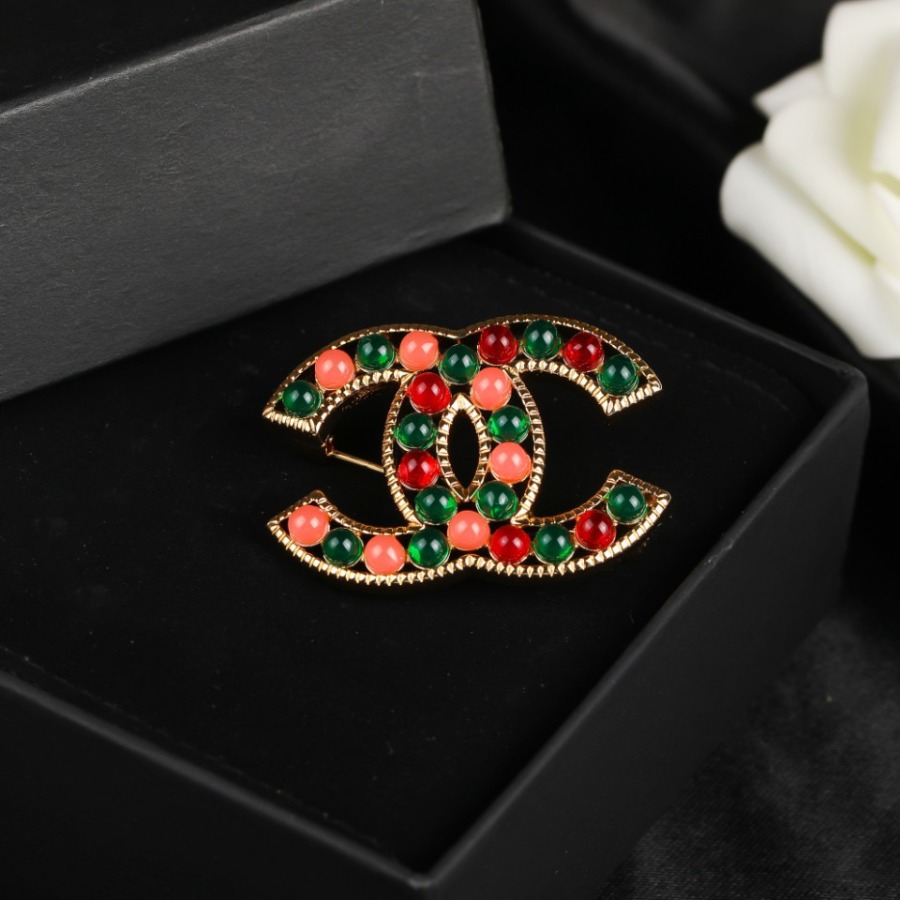 CHANEL BROOCHES