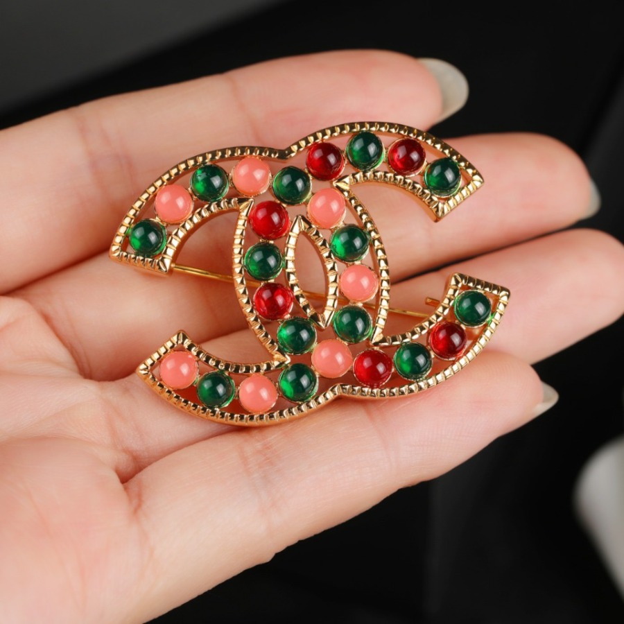 CHANEL BROOCHES