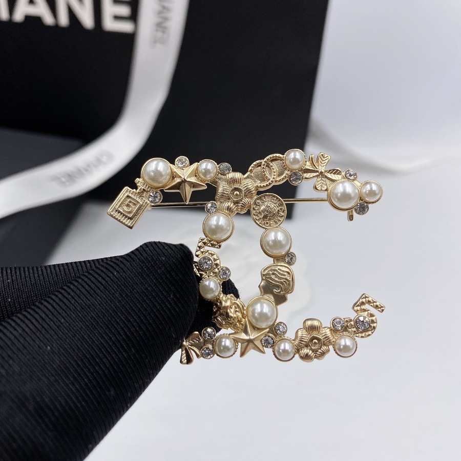 CHANEL BROOCHES
