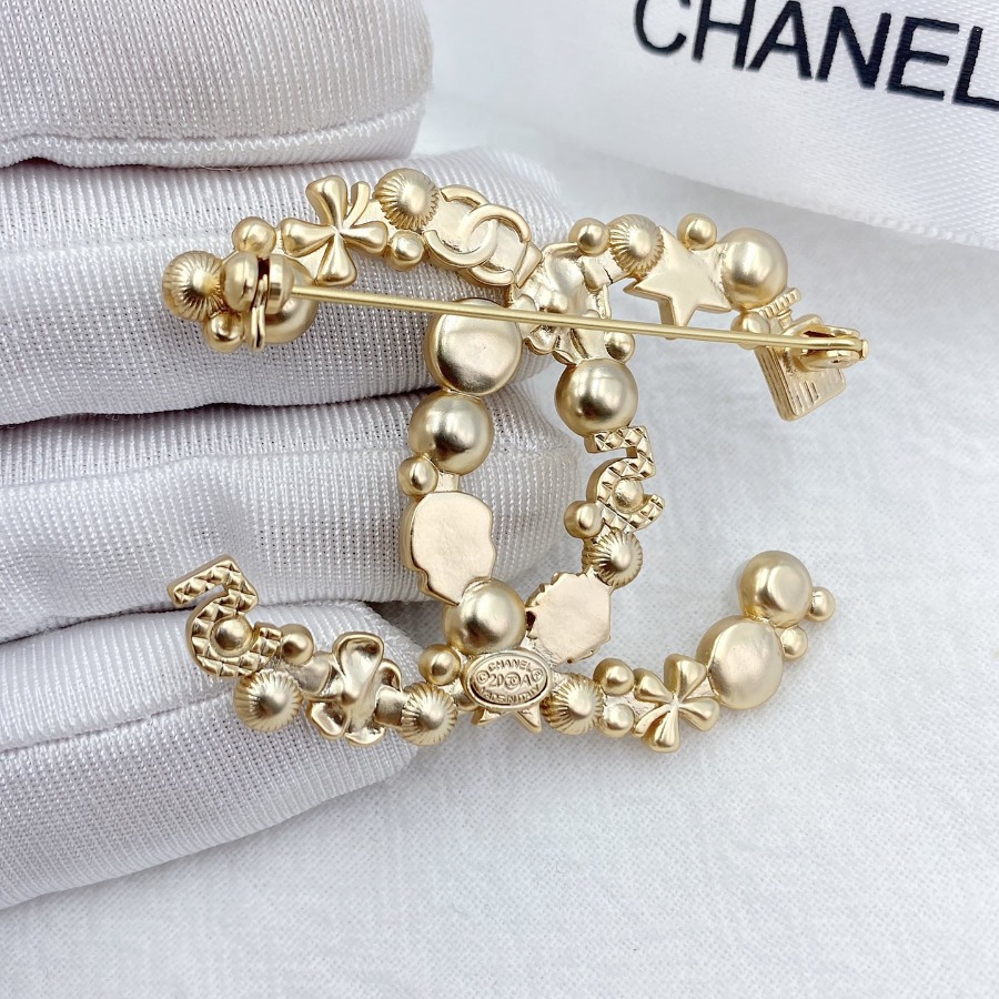 CHANEL BROOCHES