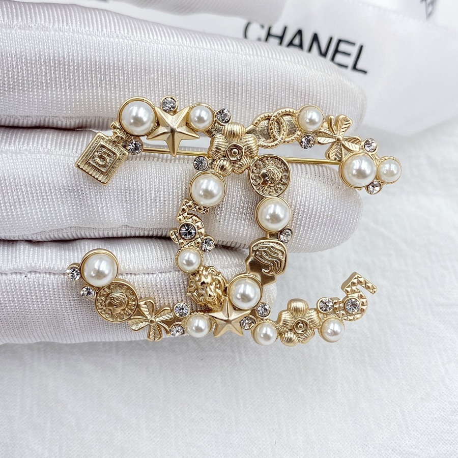 CHANEL BROOCHES