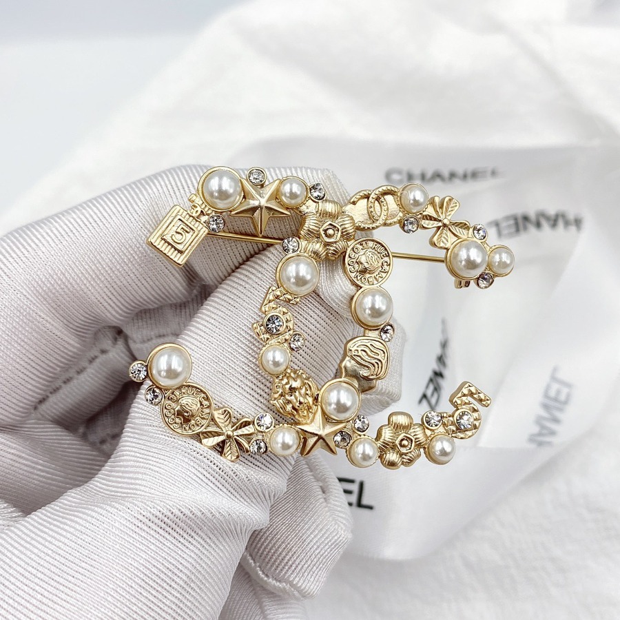 CHANEL BROOCHES