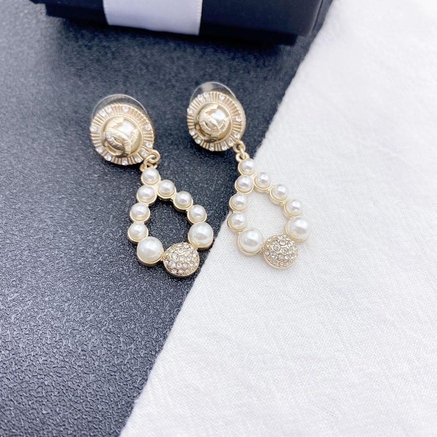CHANEL BROOCHES