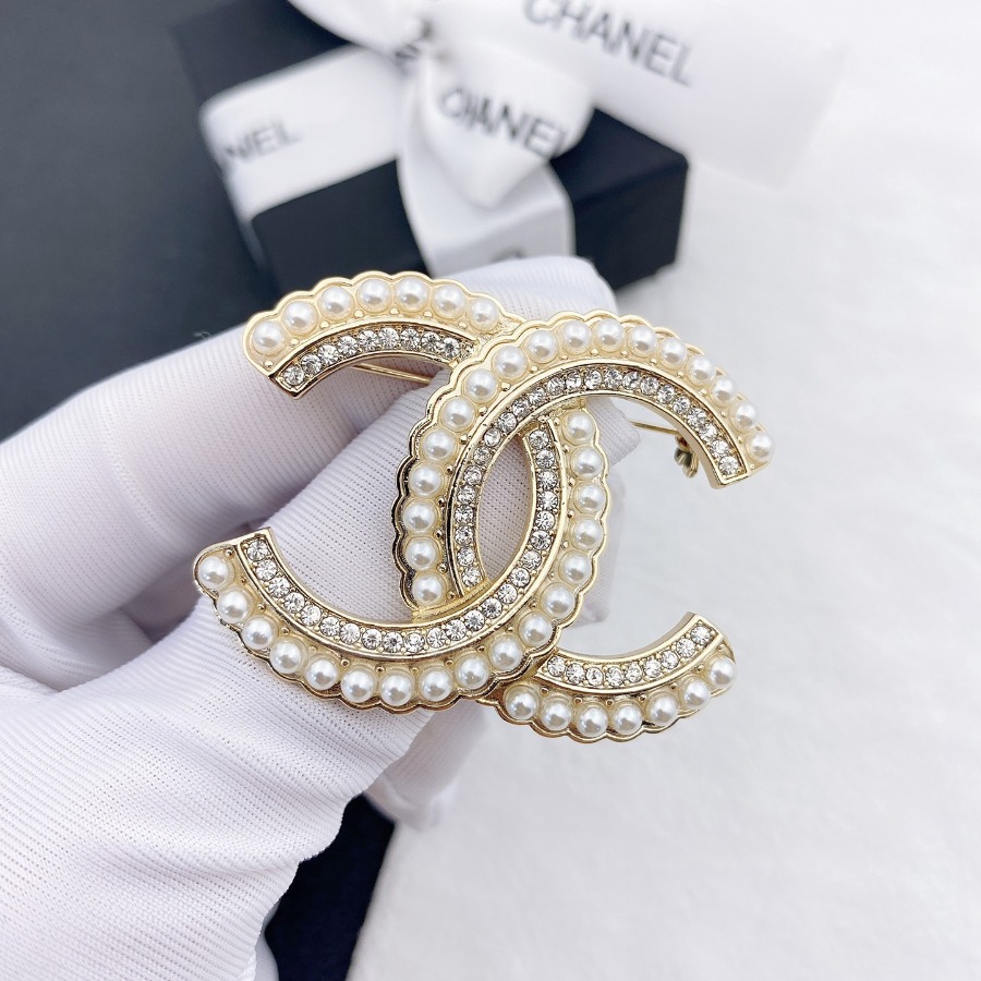 CHANEL BROOCHES