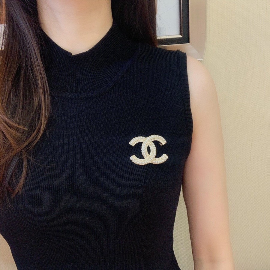CHANEL BROOCHES
