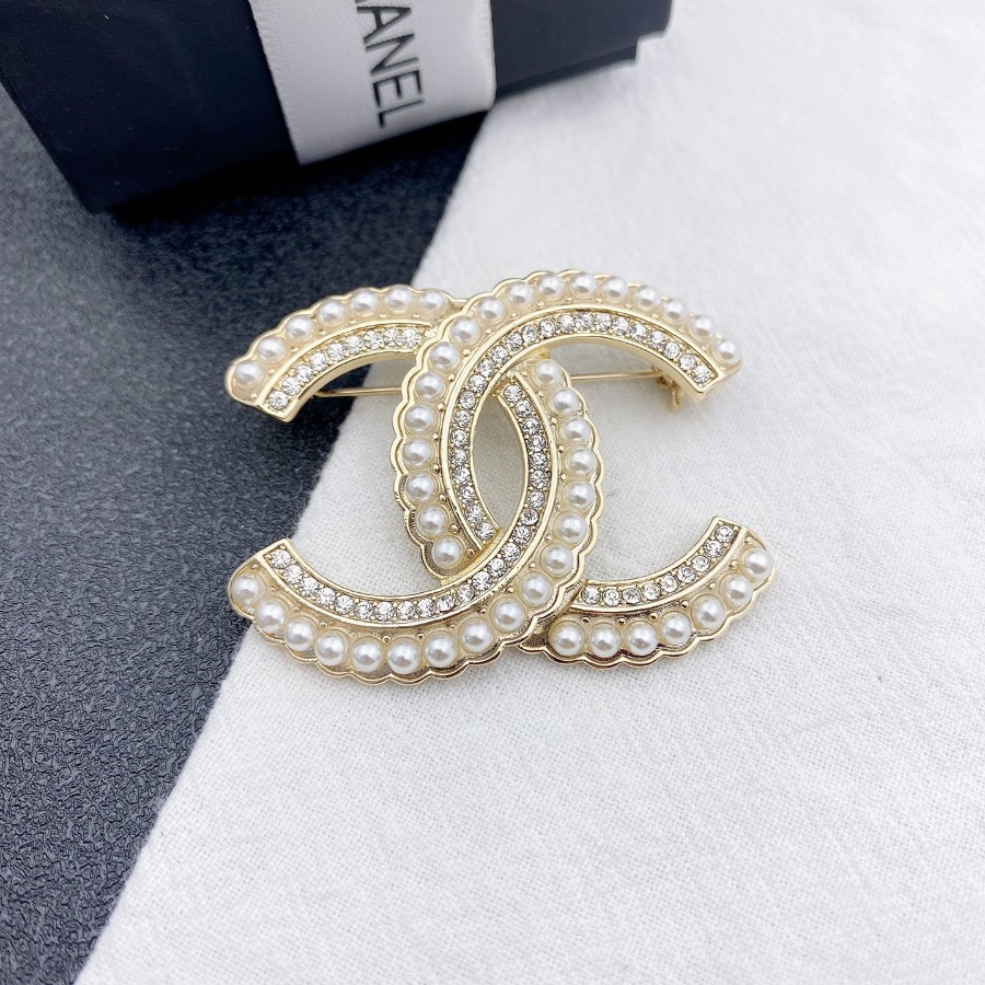 CHANEL BROOCHES