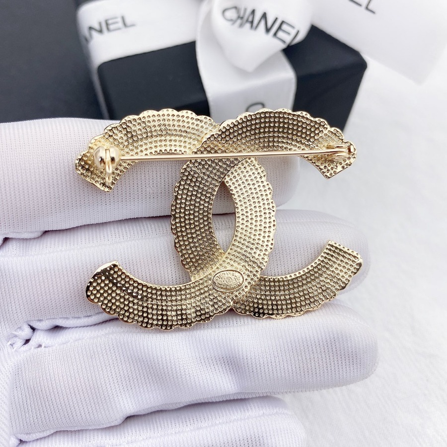 CHANEL BROOCHES