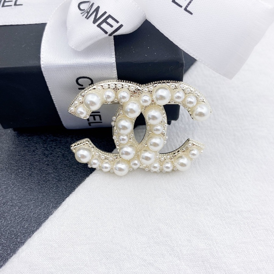 CHANEL BROOCHES