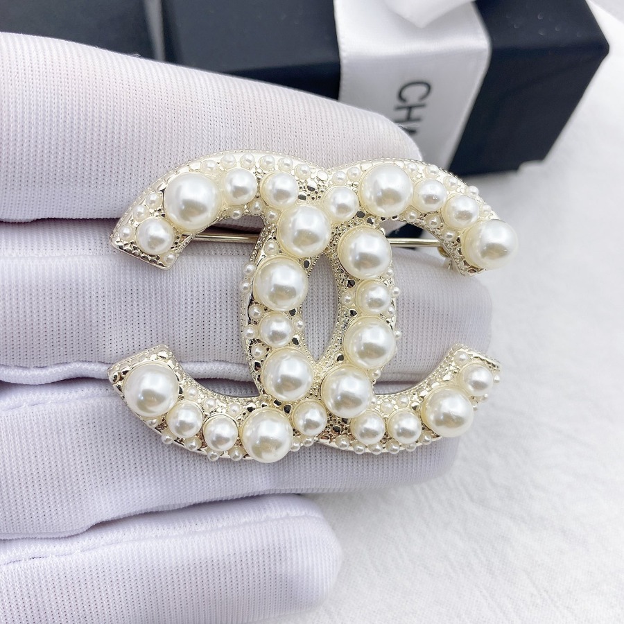 CHANEL BROOCHES