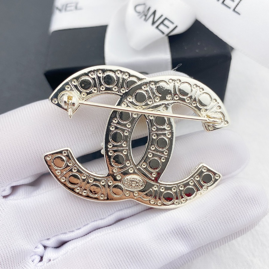 CHANEL BROOCHES