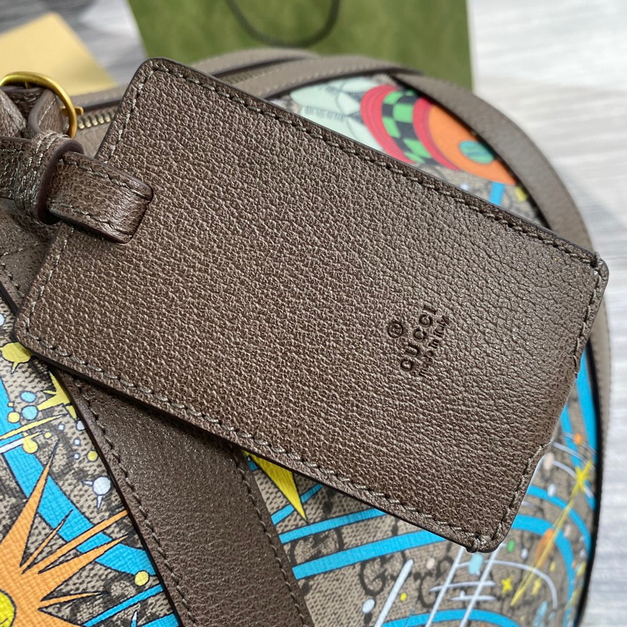 648085 Disney x Gucci Donald Duck duffle bag, gucci Duffle Bags for Men