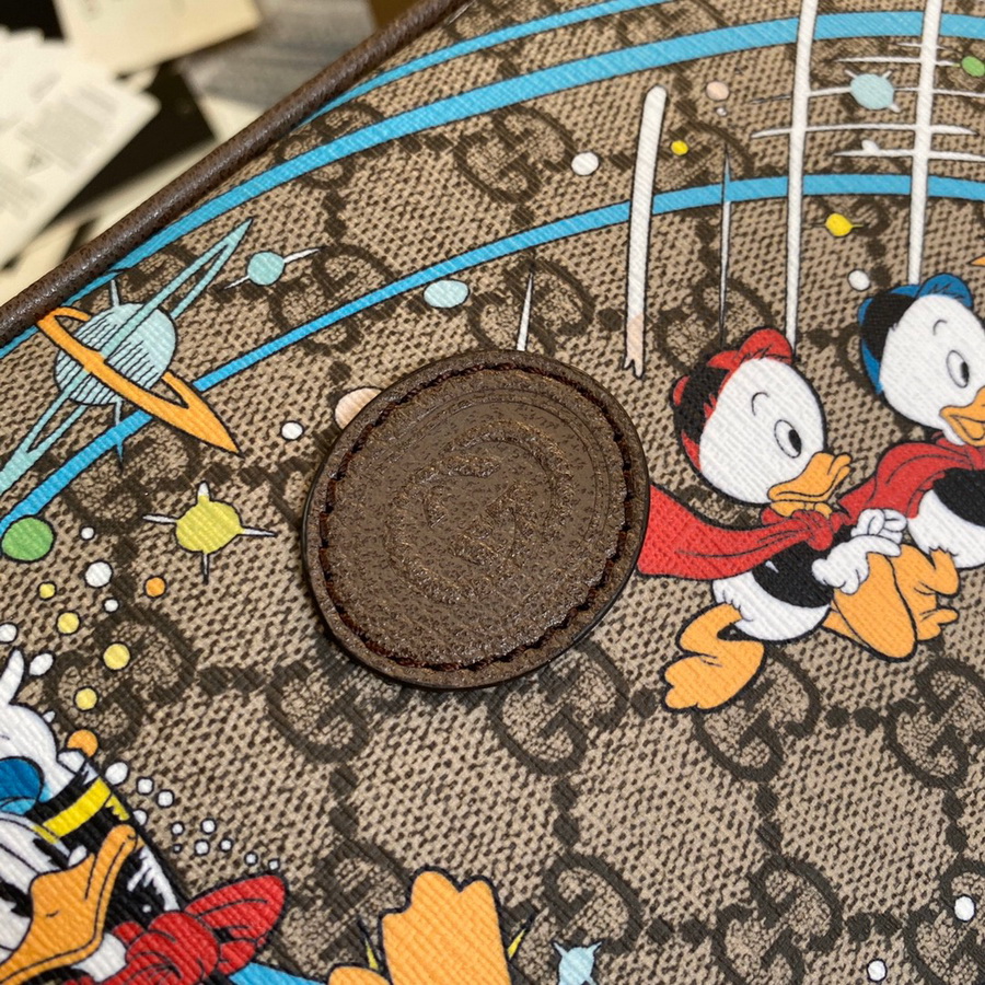 602695 Disney x Gucci Donald Duck print belt bag