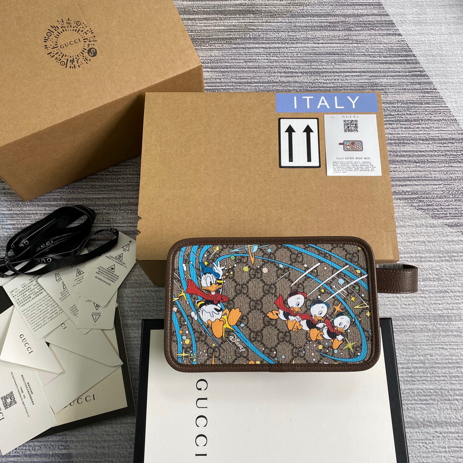 647929  Disney x Gucci Donald Duck cosmetic case