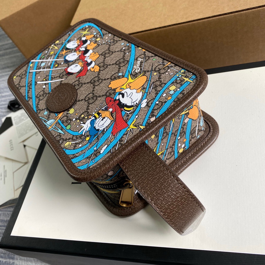 647929  Disney x Gucci Donald Duck cosmetic case