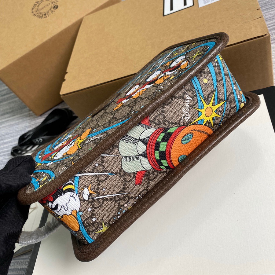 647929  Disney x Gucci Donald Duck cosmetic case