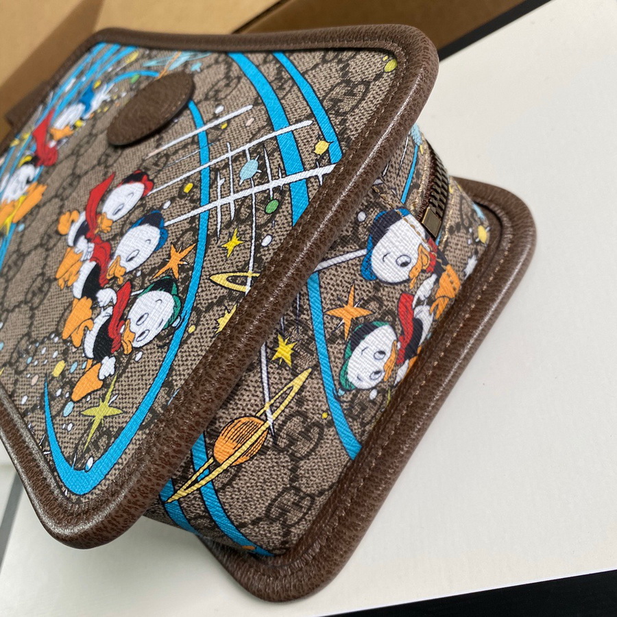 647929  Disney x Gucci Donald Duck cosmetic case